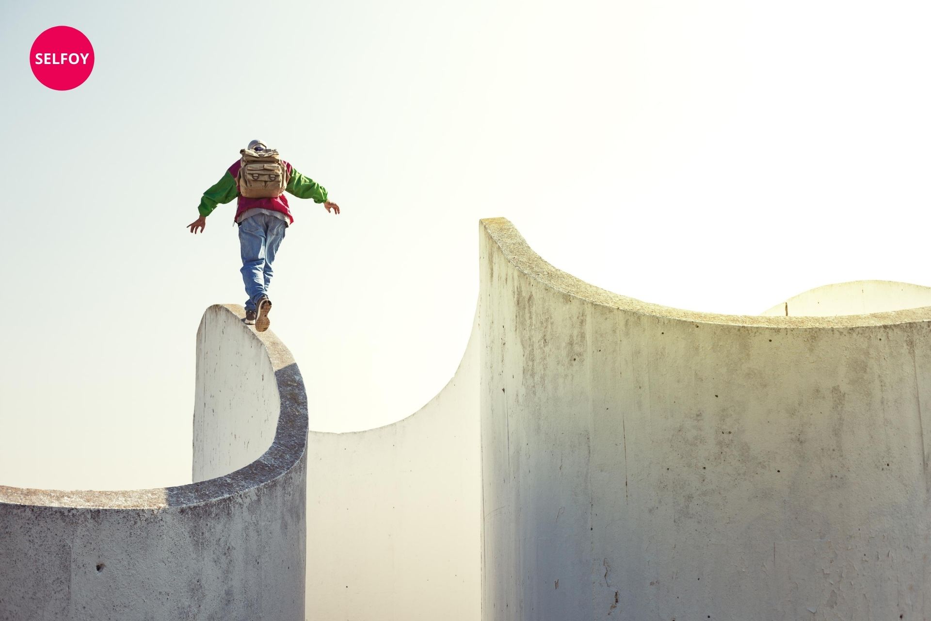 Man is walking over a edge